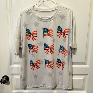 Patriotic Women’s T-Shirt with Flag and Bow Design Oversized